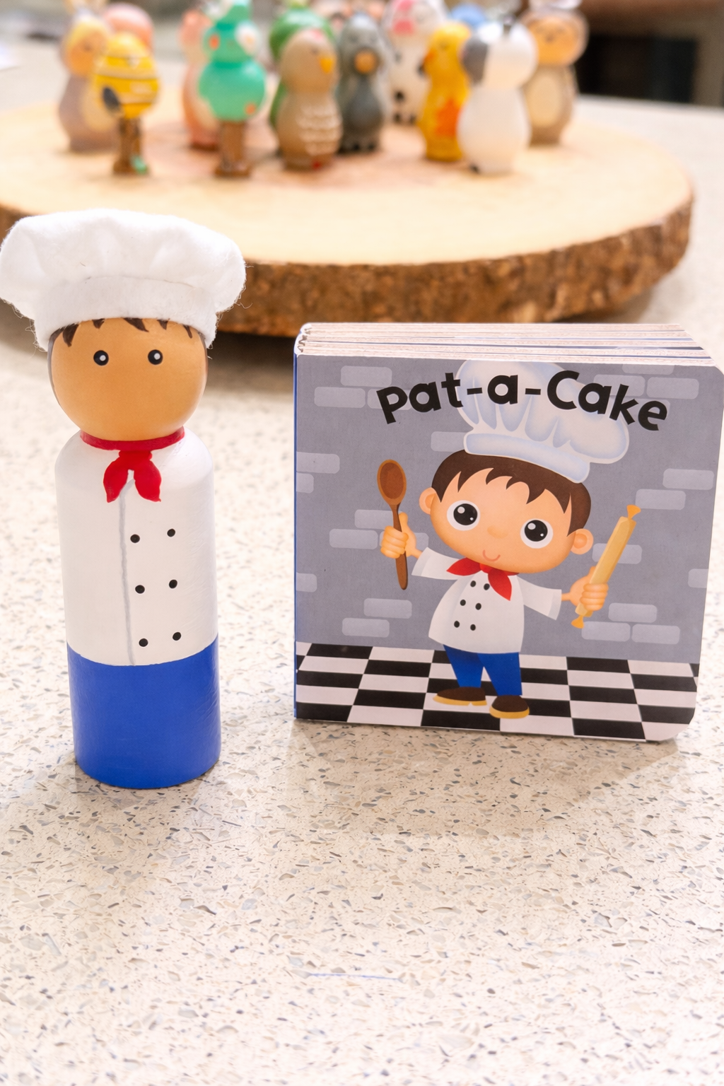 Pat-a-Cake wooden peg doll with Board book