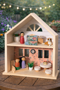 Cozy cottage dollhouse with pegs