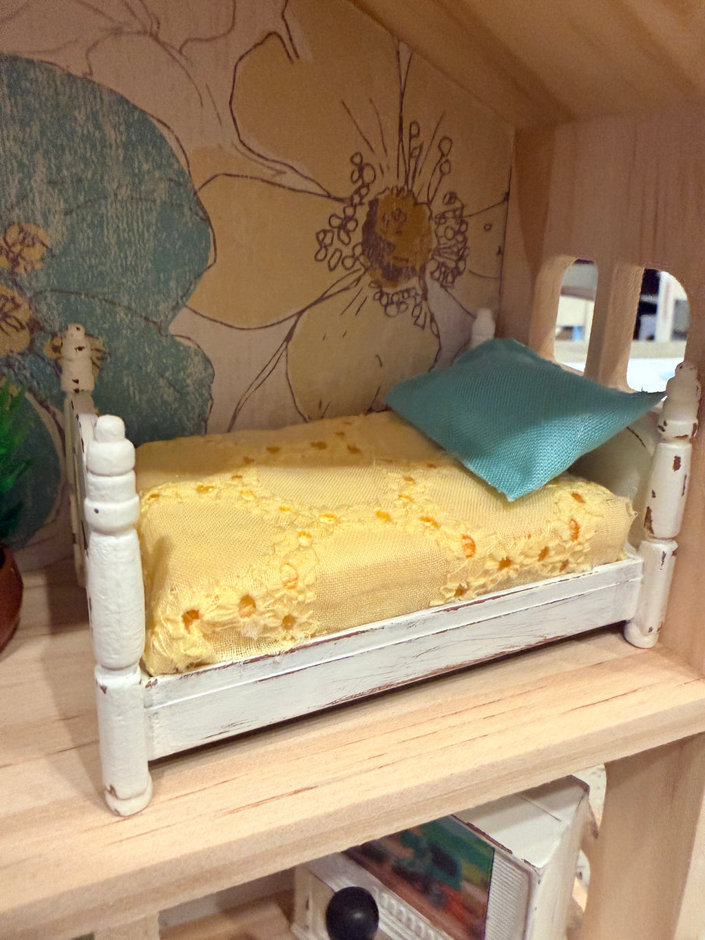 Floral cottage wooden dollhouse with peg dolls
