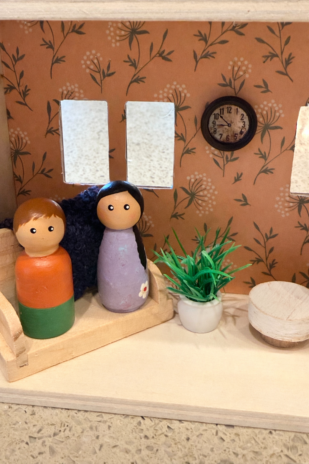 Cozy cottage dollhouse with pegs